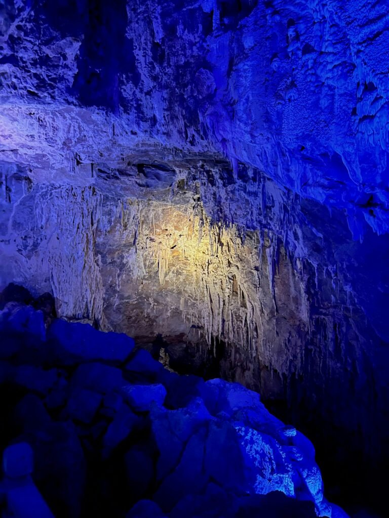 Discover the Magic of Hvar Island: Croatia’s Sunniest Paradise Explore this mesmerizing cave with dramatic stalactites and stalagmites under blue lighting.